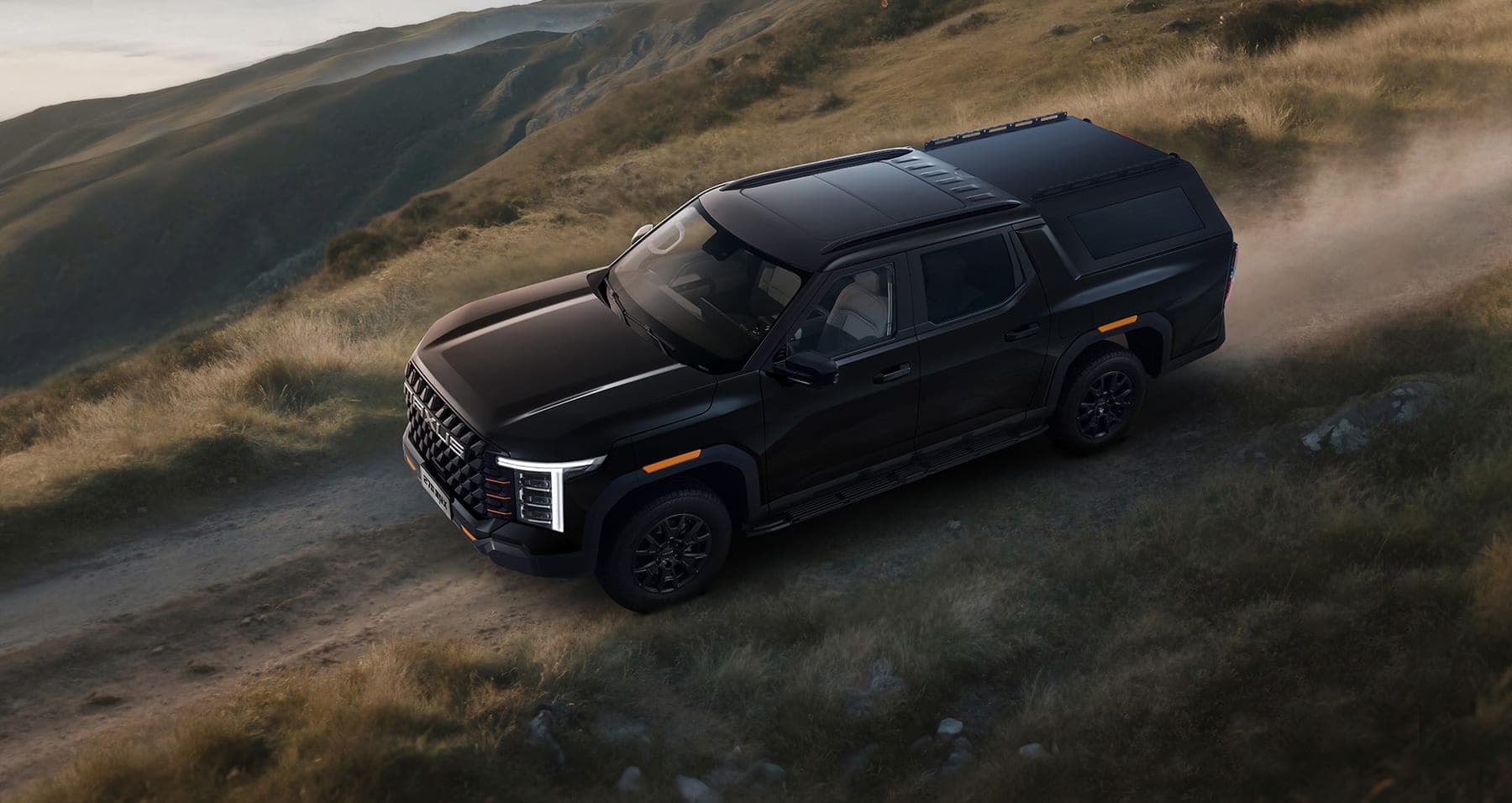 2027 MAXUS Interstellar X Passenger Edition — Double Cab Pickup Truck with Integrated Hardtop Canopy for export, rear three-quarter view on a hillside